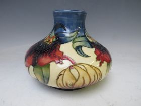 A MOORCROFT ANNA LILY PATTERN VASE, designed by Nicola Slaney, of compressed ovoid form, H 16.5