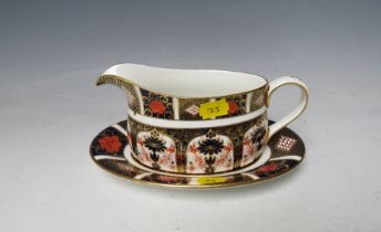 A ROYAL CROWN DERBY IMARI PATTERN 1128 GRAVY / SAUCE BOAT AND STAND