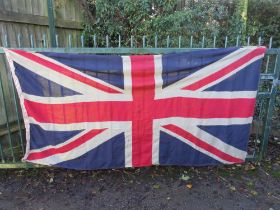 A VINTAGE UNION JACK FLAG, approximately 102 cm x 52 cm S/D