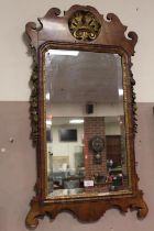 A 19TH CENTURY WALNUT AND GILT PIER MIRROR, having pierced fret detail, with trailing fruit and vine