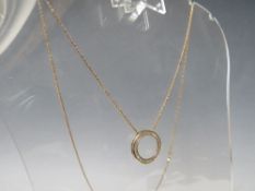 A HALLMARKED 9CT GOLD CIRCULAR CHANNEL SET DIAMOND PENDANT, on a gilt 925 silver chain