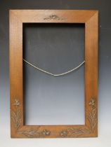 A DECORATIVE WOODEN PERIOD ART NOUVEAU FRAME, frame W 7.5 cm, rebate 60 x 36 cm
