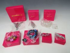 A COLLECTION OF SEVEN BUTLER AND WILSON JEWELLERY ITEMS, to include a large statement mythical