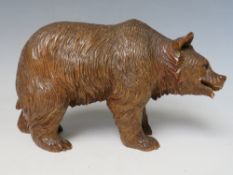 A VINTAGE BLACK FOREST BEAR A/F, H 13 cm, L 18 cm