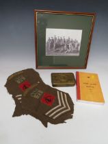 A SMALL COLLECTION OF MILITARIA, consisting of a WWI Princess Mary gift tin, a propaganda 'For