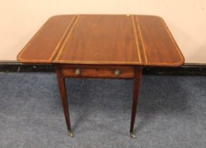 A 19TH CENTURY MAHOGANY PEMBROKE TABLE WITH CROSSBANDED DETAIL, having single frieze drawer,