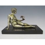 A VINTAGE ART DECO SILVERED METAL FIGURE OF A FEMALE NUDE HOLDING A BIRD, on a marble base, H 15 cm,