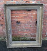A GILT RECTANGULAR PICTURE FRAME, with acorn moulding and slip, rebate 90 x 70 cm