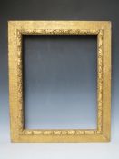 A 19TH CENTURY ART AND CRAFTS GOLD FRAME, with acorn leaf design, frame W 9 cm, rebate 59.5 x 47.5