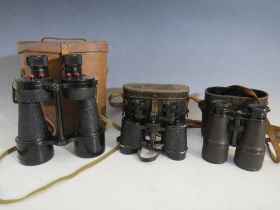 A SET OF WW2 BINO PRISM No. 5 x 7 BINOCULARS, stamped NLI 1944, together with a pair of