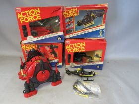 A COLLECTION OF FOUR BOXED ACTION MAN ACTION FORCE VEHICLES TO INCLUDE ROBOSKULL AND RED WOLF,