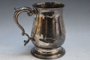 A HALLMARKED SILVER TANKARD - LONDON 1773, with later applied shield cartouche having engraved