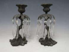 A PAIR OF 19TH CENTURY BRONZE CANDLESTICKS WITH GLASS LUSTRES, H 21 cm