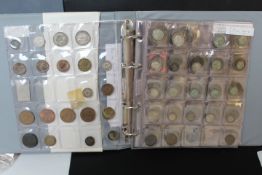 AN ALBUM OF BRITISH AND WORLD COINS AND TOKENS, to include crowns 1898 LXI and LXII, 1937 and
