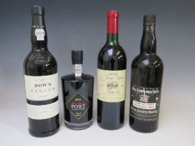 A BOTTLE OF REAL COMPANHIA VELHA VINTA DO PORTO VINTAGE 1979, having damage to seal, together with a