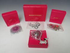A COLLECTION OF FIVE BUTLER AND WILSON JEWELLERY ITEMS, to include a large statement shooting star -