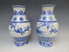 A PAIR OF CHINESE BLUE AND WHITE BALUSTER VASES WITH TEN CHARACTER MARKS, each vase decorated with