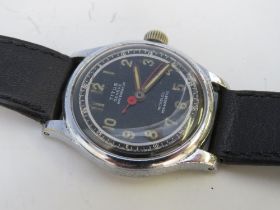 A VINTAGE TITAN MILITARY STYLE WRISTWATCH WITH LEATHER STRAP, dial Dia. 2.5 cm