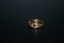 AN 18CT GOLD RUBY AND DIAMOND RING, approx weight 2.6g, ring size K 1/2