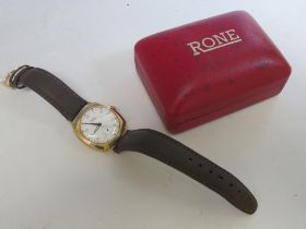 A VINTAGE RONE 9CT GOLD ART DECO STYLE WRIST WATCH, on leather strap, boxed, dial Dia. 2.5 cm