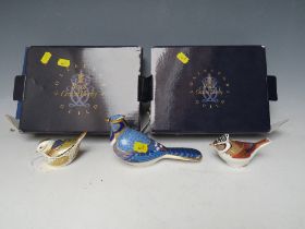 THREE ROYAL CROWN DERBY BIRD PAPERWEIGHTS, comprising a firecrest and a crested tit - both boxed,