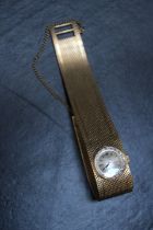 A HALLMARKED 18 CARAT GOLD LADIES OMEGA WRIST WATCH, inner casing stamped 'Omega Watch Co Fab Swisse