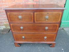 A 19TH CENTURY MAHOGANY CHEST OF SMALL PROPORTIONS, having two short above two longer graduated