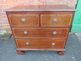 A 19TH CENTURY MAHOGANY CHEST OF SMALL PROPORTIONS, having two short above two longer graduated