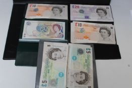 A QUANTITY OF BANK OF ENGLAND PAPER ISSUE £5, £10 AND £20 NOTES IN CONSECUTIVE RUNS AND ISLE OF