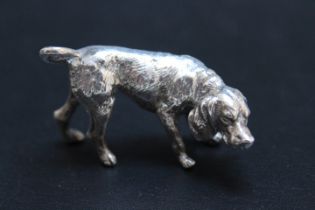 A HALLMARKED MODEL OF A DOG - LONDON 1985, approx weight 55g, W 5.5 cm