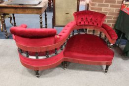AN EDWARDIAN EBONISED AND UPHOLSTERED LOVE / CONVERSATION SEAT, W 142 cm