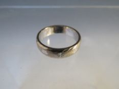 A 9CT WHITE GOLD WEDDING BAND, approximately 5.53 g, ring size R ½