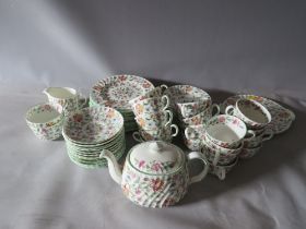 A MINTON HADDON HALL PART TEA SET, comprised of approximately sixty pieces, to include tea pot, milk