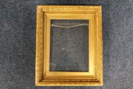 A 19TH CENTURY GOLD FRAME, with acanthus leaf design and gold slip, glazed, frame W 5.5 cm, slip