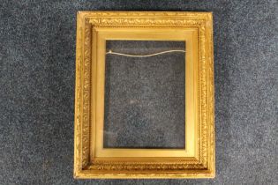 A 19TH CENTURY GOLD FRAME, with acanthus leaf design and gold slip, glazed, frame W 5.5 cm, slip