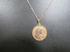 A 9CT PENDANT OF MARY ON A 9CT CHAIN approx weight 3g