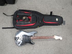 AN ELECTRIC GUITAR WITH THREE SILVER COIL PICK-UPS , FITTED WITH A ROLAND GK " 2A SYMPH ATTACHMENT