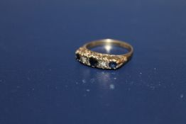 A HALLMARKED 9 CARAT GOLD SAPPHIRE AND DIAMOND RING, 1.8g, ring size K