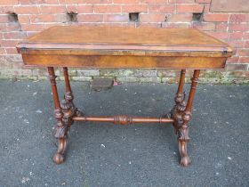 A VICTORIAN WALNUT FOLD-OVER CARD TABLE WITH INLAID TUNBRIDGE WARE DETAIL, raised on four turned