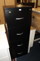 A MODERN FOUR DRAWER FILING CABINET