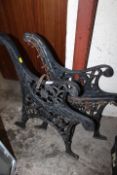 A PAIR OF TWO CAST IRON BENCH ENDS