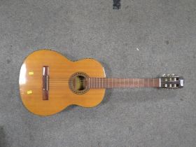 AN ANGELICA ACOUSTIC GUITAR