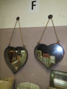 TWO MODERN 'RUSTED METAL' HEART SHAPED HANGING MIRRORS