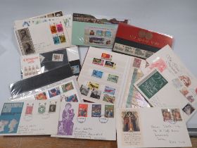 A SMALL COLLECTION OF STAMPS AND FIRST DAY COVERS
