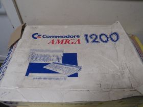 A VINTAGE COMMODORE 1200 AMIGA COMPUTER SYSTEM IN ORIGINAL BOX (UNCHECKED)