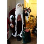 A 6FT MODERN SANTA CLAUSE WITH PRESENTS & SACK