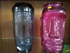 TWO LARGE AZTEC GLASS HEAD VASES