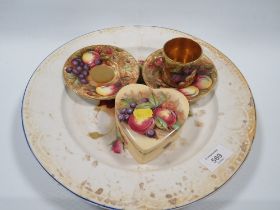 A AYNSLEY ORCHARD GOLD GILDED COFFEE CAN AND SAUCER TOGETHER WITH ANOTHER SAUCER , HEART SHAPE