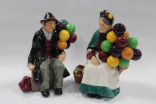 A ROYAL DOULTON FIGURINE THE BLUE MAN TOGETHER WITH THE OLD BALLOON SELLER