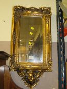 A MODERN GILT MIRROR WITH BRACKET H-66 CM